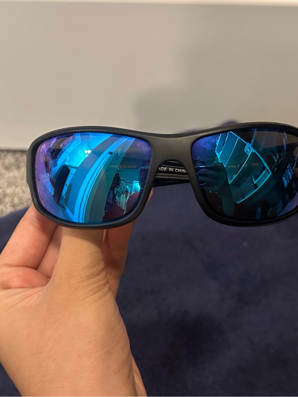 New Balance Black Frame Sunglasses with Blue Mirror Lenses